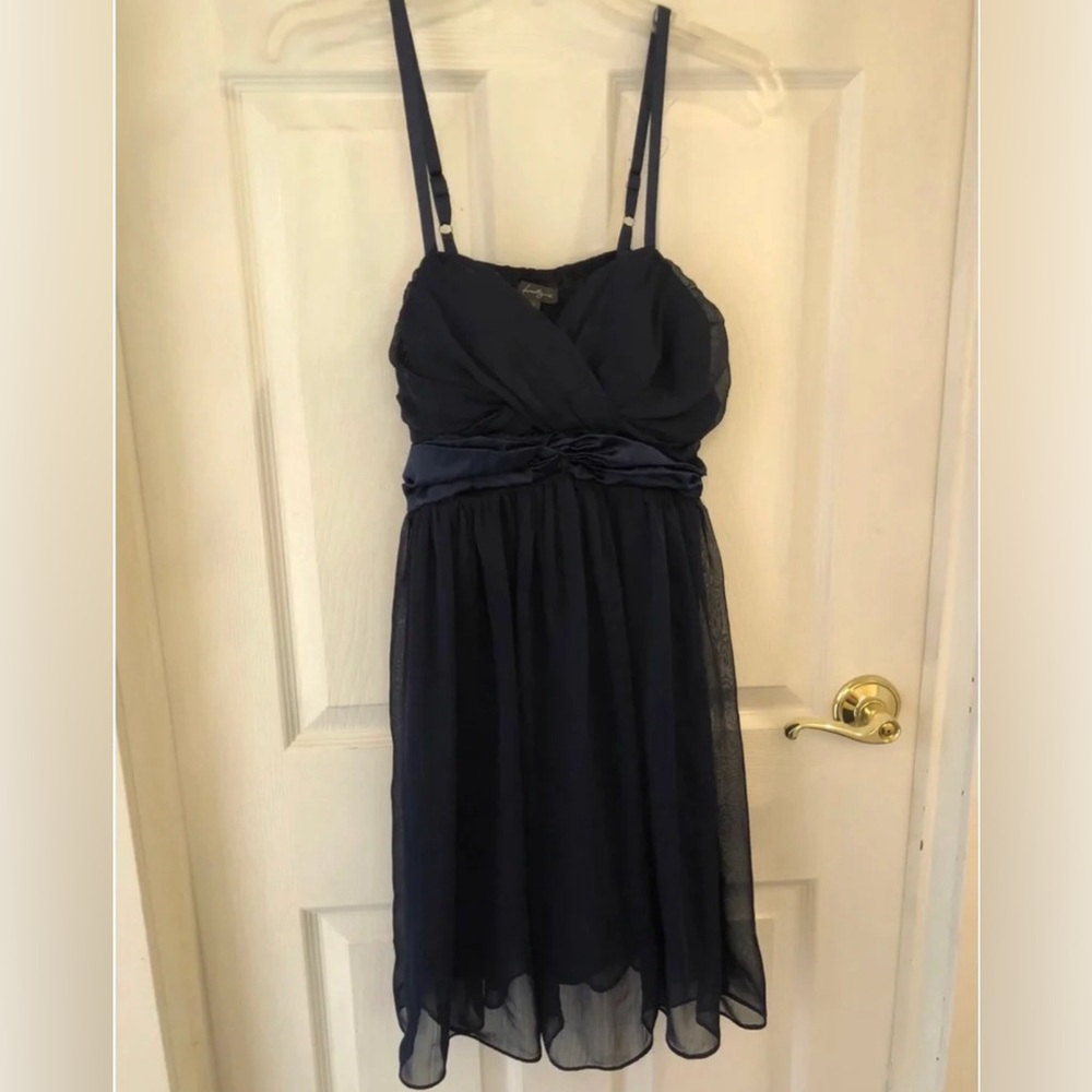 Size L Navy dress from Forever 21
With satin sash and ties in the back